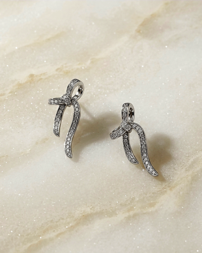 Bow shaped earrings with tiny stones. Good for gift.
